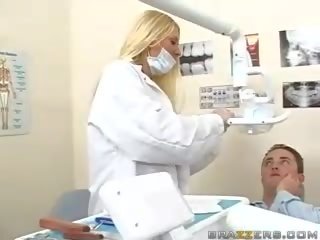 Superb rumaja hot pirang dentist shows her boobs to a patient