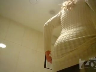 Flirty blonde in toilet shaved pussy and anus closeups.